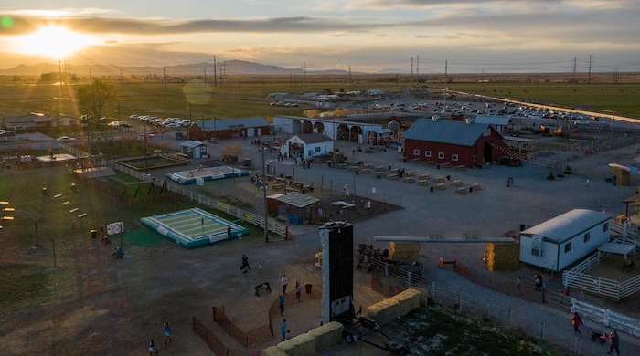 (Leah Hogsten | The Salt Lake Tribune) The sun sets on the farm during the Baby Animal Festival  and Tulip Field Festival at Cross E Ranch, April 23, 2021. The festival runs unlil May 8.