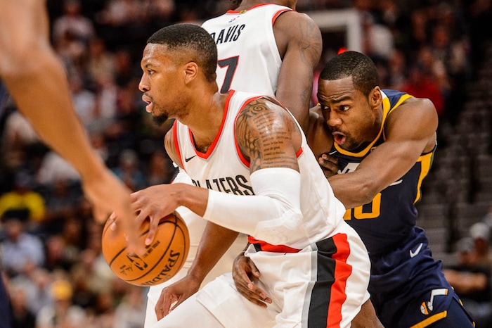 (Trent Nelson | The Salt Lake Tribune)  Utah Jazz guard Alec Burks (10) fights through a pick by Portland Trail Blazers forward Ed Davis (17) as the Utah Jazz host the Portland Trail Blazers, NBA basketball in Salt Lake City, Wednesday November 1, 2017. Portland Trail Blazers guard Damian Lillard (0) with the ball.