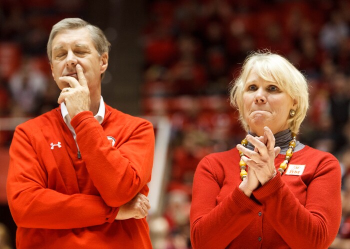 (Trent Nelson  |  Tribune File Photo)  Utah athletic director Dr. Chris Hill and Jodi Majerus (sister of former Utah basketball coach Rick Majerus) take in the moment as coach Majerus' sweater is retired into the rafters of the Huntsman Center, as Utah hosts Colorado, college basketball Saturday, February 2, 2013 in Salt Lake City.