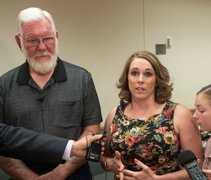 (Rick Egan  |  The Salt Lake Tribune)       Breezy's aunt, Amanda Hunt, talks to the media after Jerrod Baum appeared for a hearing in Provo. Baum is accused of killing 18-year-old Riley Powell and 17-year-old Brelynne “Breezy” Otteson in December and dumping their bodies into an abandoned mine shaft. Thursday, April 26, 2018.   

