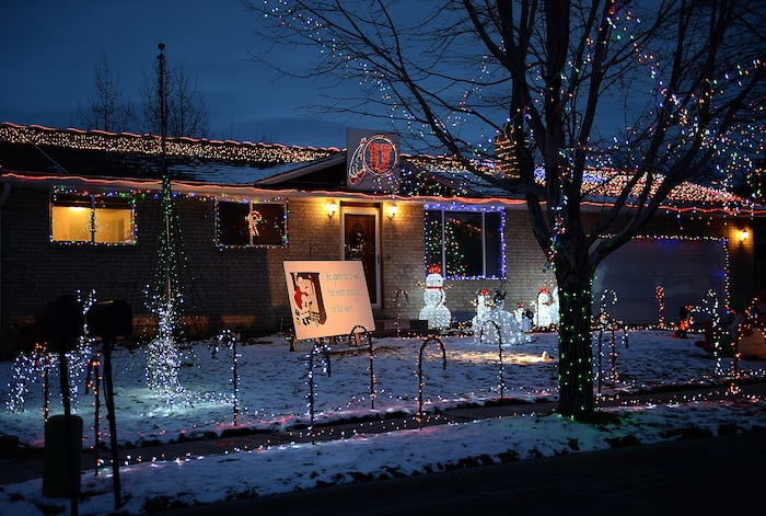(Scott Sommerdorf | The Salt Lake Tribune)
A view of some of the houses on Royalwood Drive in Taylorsville, Friday, December 22, 2017. "Christmas Street" is a Taylorsville neighborhood where residents up and down the street decorate their homes every year with Christmas lights. The United States uses more electricity for Christmas lights than some countries use all year.