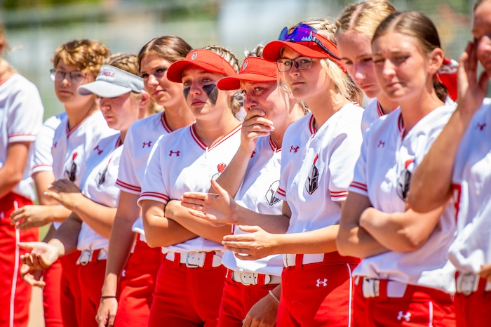 (Isaac Hale | Special to The Tribune) Mountain Ridge players watch as the Spanish Fork Lady Dons celebrate after defeating the Mountain Ridge Sentinels in a best-of-three series to win the 5A state softball championship at the Spanish Fork Sports Park on Friday, May 28, 2021.