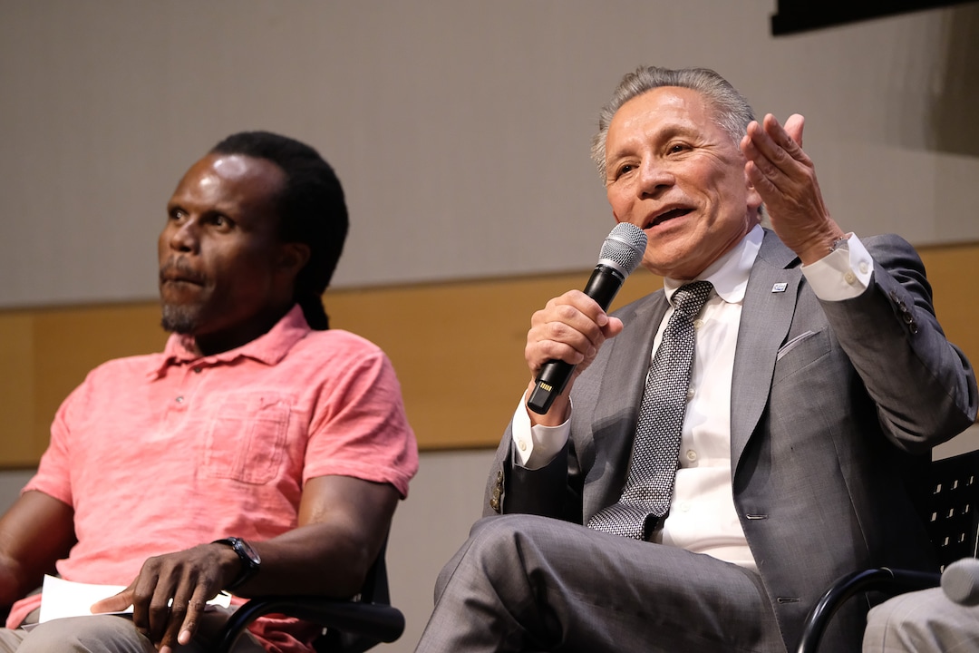 (Francisco Kjolseth  |  The Salt Lake Tribune)  David Ibarra takes a turn making a point alongside Ali Olufeko sitting in for Rainer Huck during a debate for Salt Lake City mayor at the Salt Lake City Library on Wed. June 26, 2019.
