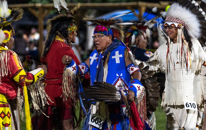 (Leah Hogsten | The Salt Lake Tribune Dancers congratulate each other after every dance at the 41st Annual Paiute Indian Tribe of Utah Restoration Gathering, Aug. 13, 2021 in Cedar City, Utah.