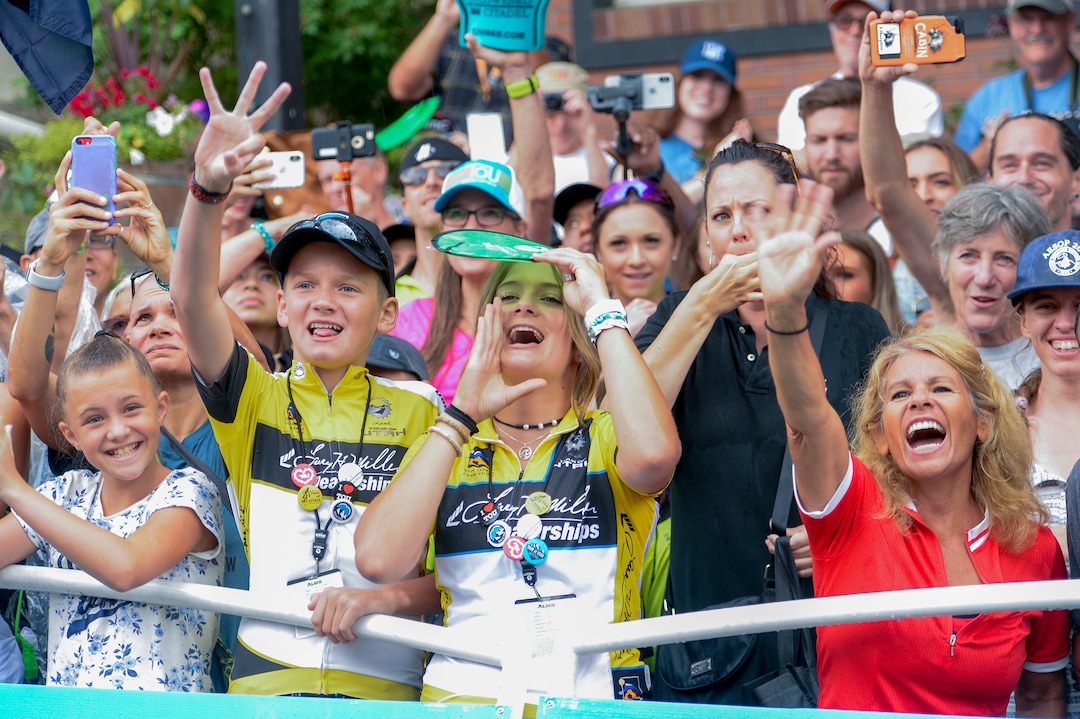 Leah Hogsten  |  The Salt Lake Tribune  Fans watch as  Tour of Utah overall winner Sepp Kuss with Team Lotto NL-Jumbo celebrates on the podium with fans after the Stage 6 Park City finish Sunday, August 12, 2018.  .  