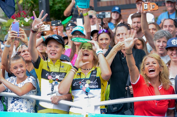 Leah Hogsten | The Salt Lake Tribune Fans watch as Tour of Utah overall winner Sepp Kuss with Team Lotto NL-Jumbo celebrates on the podium with fans after the Stage 6 Park City finish Sunday, August 12, 2018.
.