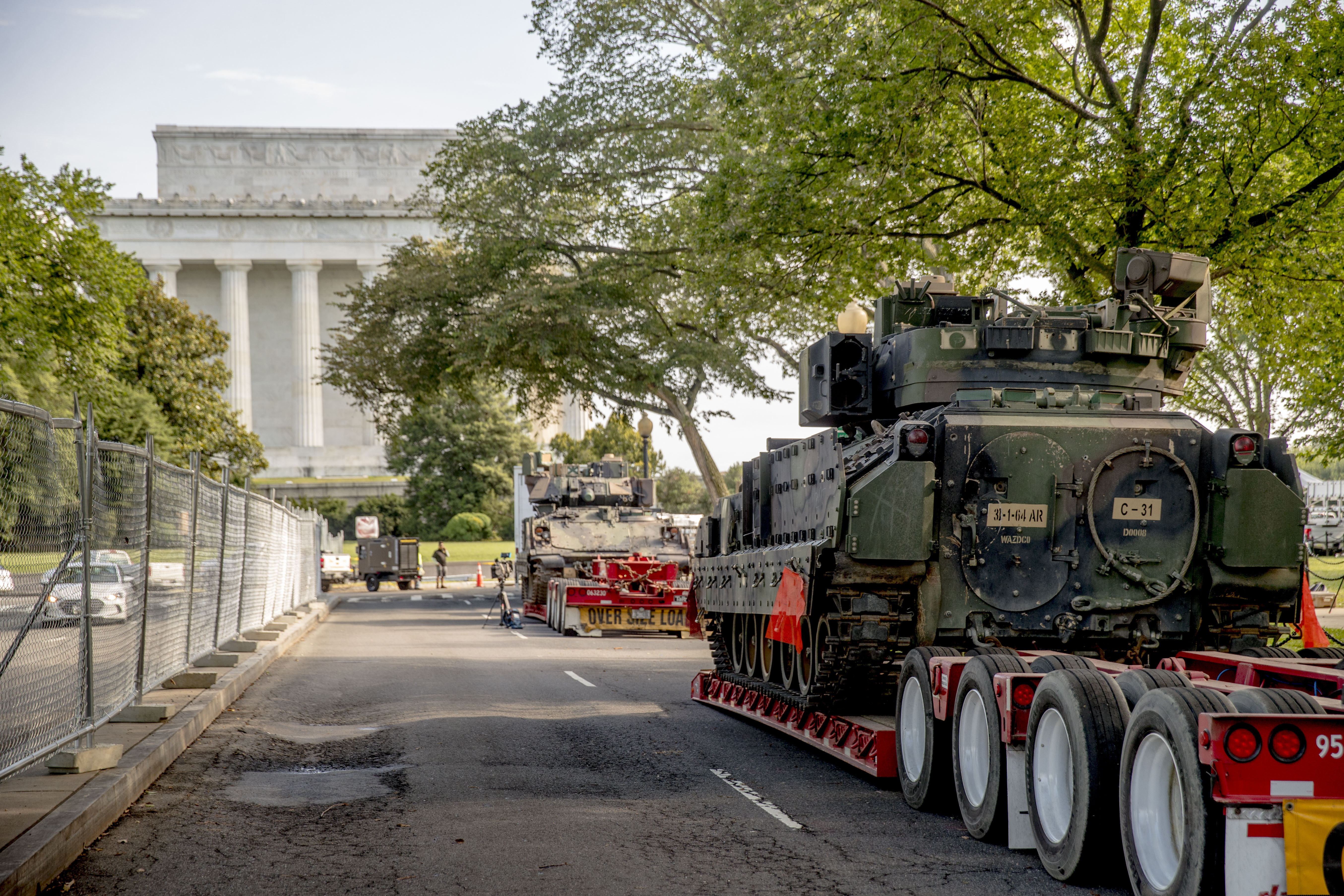 Two Bradley Fighting Vehicles are parked nearby the Lincoln Memorial for President Donald Trump's 'Salute to America' event honoring service branches on Independence Day, Wednesday, July 3, 2019, in Washington. President Donald Trump is promising military tanks along with "Incredible Flyovers & biggest ever Fireworks!" for the Fourth of July. (AP Photo/Andrew Harnik)