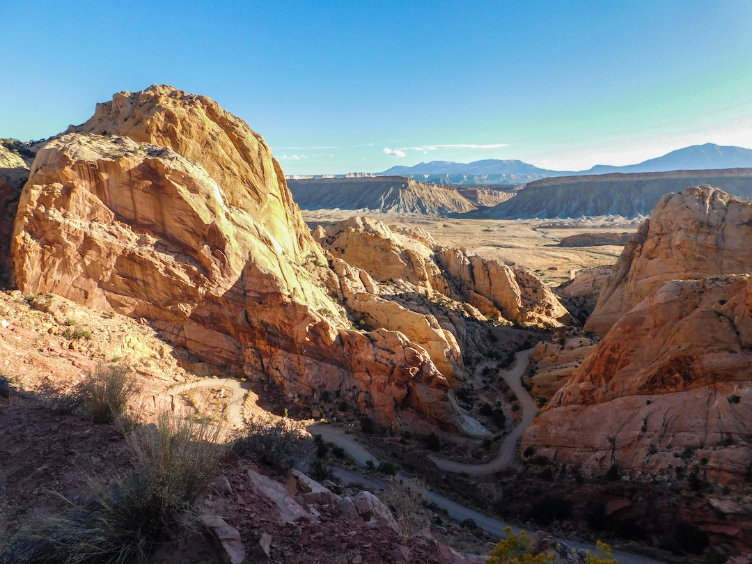 (Erin Alberty | The Salt Lake Tribune) The Burr Trail winds up the Waterpocket Fold and into the morning sun Oct. 5, 2015 in Capitol Reef National Park.