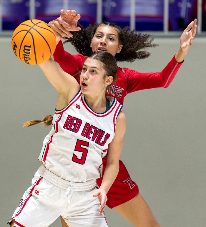 (Rick Egan | The Salt Lake Tribune) Springville Red Devil Sami Stepp goes for ball as Bountiful Redhawks Taylor Harvey defends, in the Girls 5A State Championship between the Springville Red Devils and the Bountiful Redhawks, at Weber State, on Saturday, March 4, 2023.
