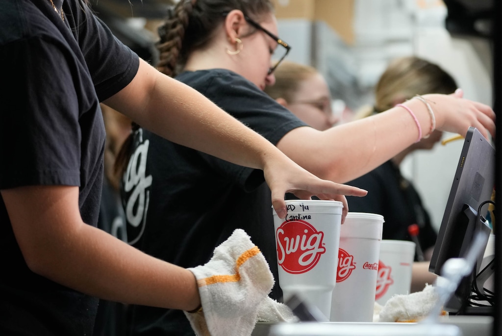 (Francisco Kjolseth | The Salt Lake Tribune) Swig staff crank through orders as the Salt Lake Bees in South Jordan become the Utah Dirty Sodas on Wednesday nights, when the stadium offers $3 dirty sodas, Wednesday, July 22, 2026.