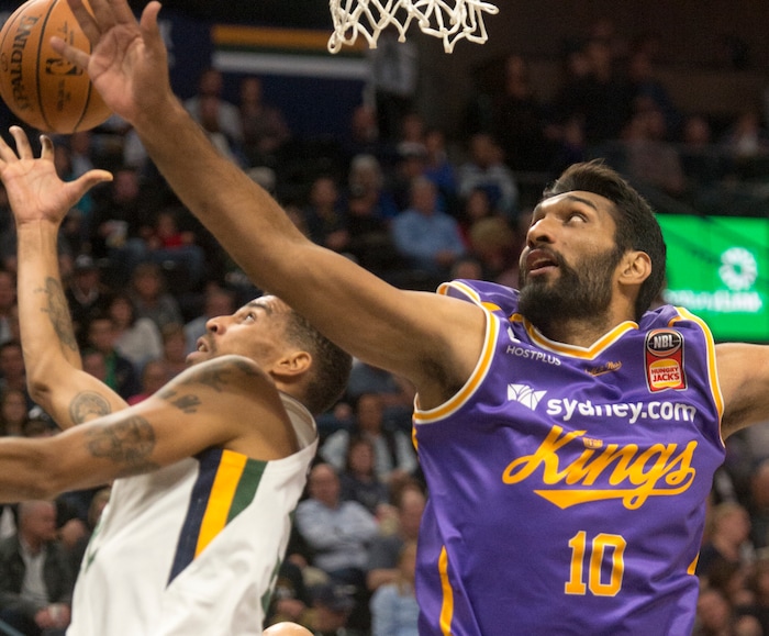 (Rick Egan  |  The Salt Lake Tribune)  Utah Jazz forward Royce O'Neale (23) goes for the ball along with Sydney Kings guard Kevin Lisch (11), in preseason basketball Utah Jazz vs.Sydney Kings, in Salt Lake City, Sunday, October 2, 2017.


