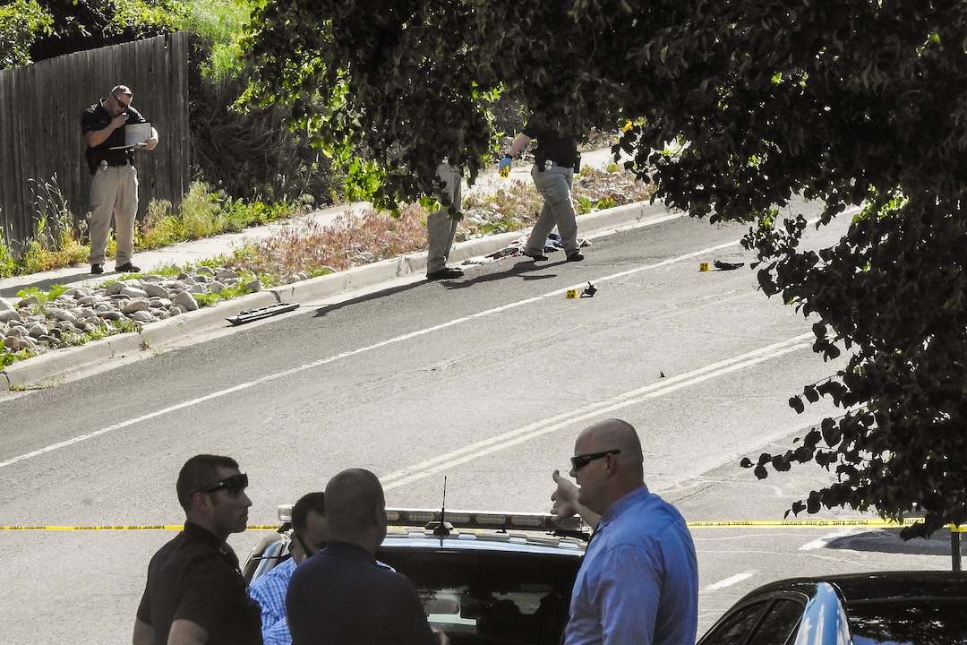 Chris Detrick  |  The Salt Lake TribunePolice officers investigate the scene of a shooting Tuesday, June 6, 2017. The shooting occurred at about 3:45 p.m. outside of a residence at about 2175 East and Alta Canyon Drive (about 8630 South), said Sandy police Sgt. Jason Nielsen. Nielsen said the shooter was among the dead and, therefore, there is no threat to the public.