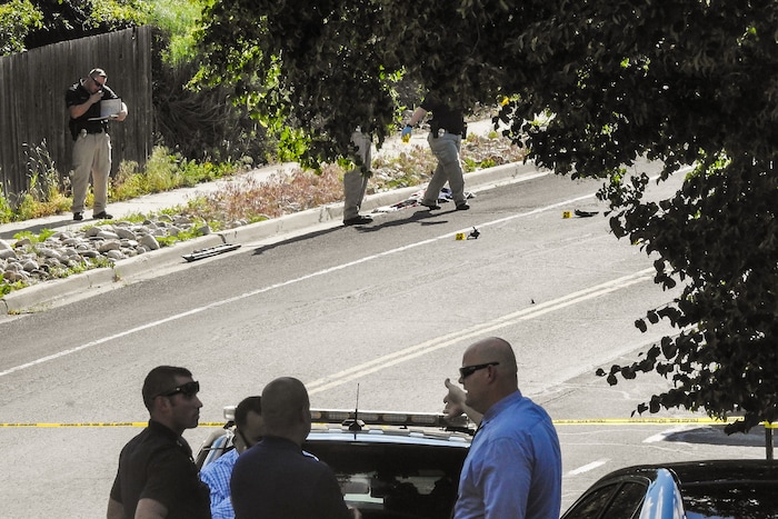 Chris Detrick | The Salt Lake Tribune
Police officers investigate the scene of a shooting Tuesday, June 6, 2017. The shooting occurred at about 3:45 p.m. outside of a residence at about 2175 East and Alta Canyon Drive (about 8630 South), said Sandy police Sgt. Jason Nielsen. Nielsen said the shooter was among the dead and, therefore, there is no threat to the public.