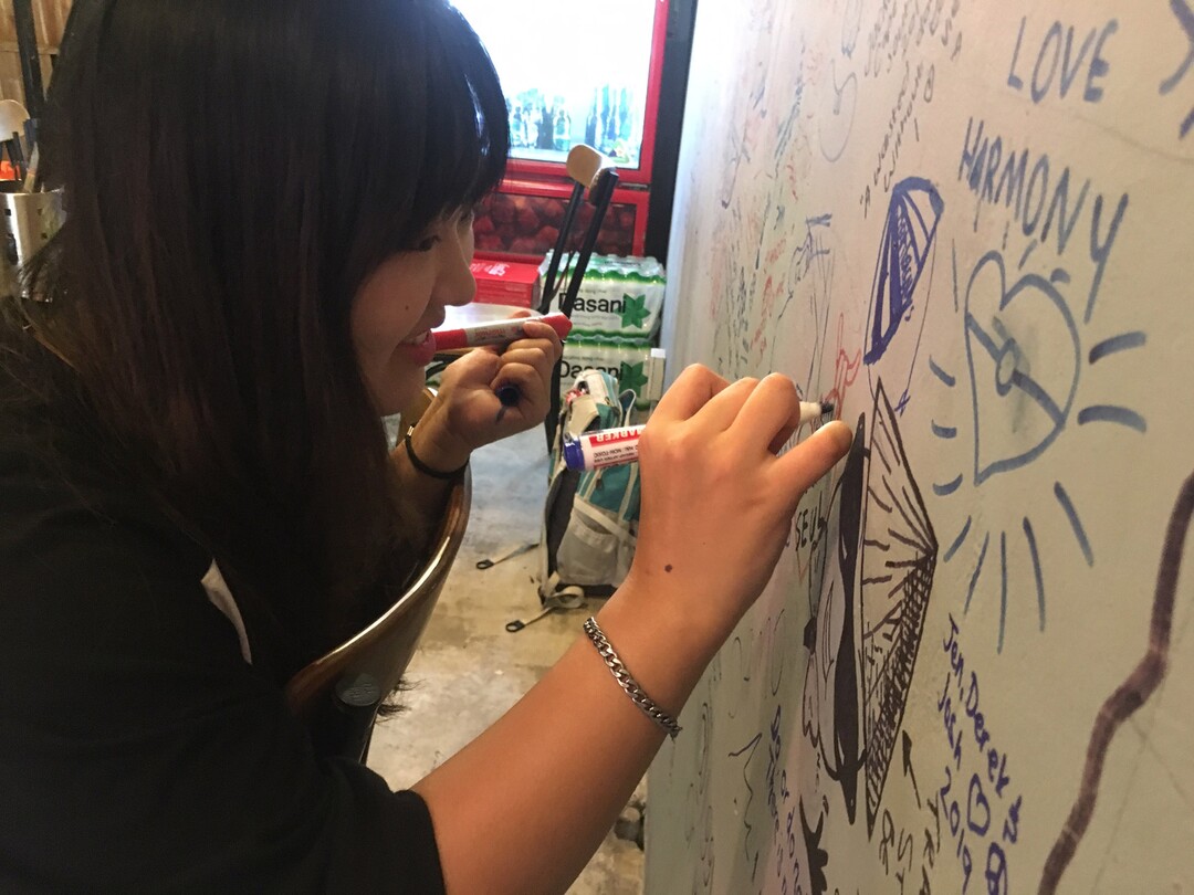 (Matilyn Mortensen | Special to The Tribune) Visitors from around the world have left their mark on the walls of the Nonla Guys restaurant in Ho Chi Mihn City in Vietnam. Some have identified their homes on a large hand-drawn world map, while others have written messages in their native language. There are notes on the wall from residents of each of the six inhabited continents.