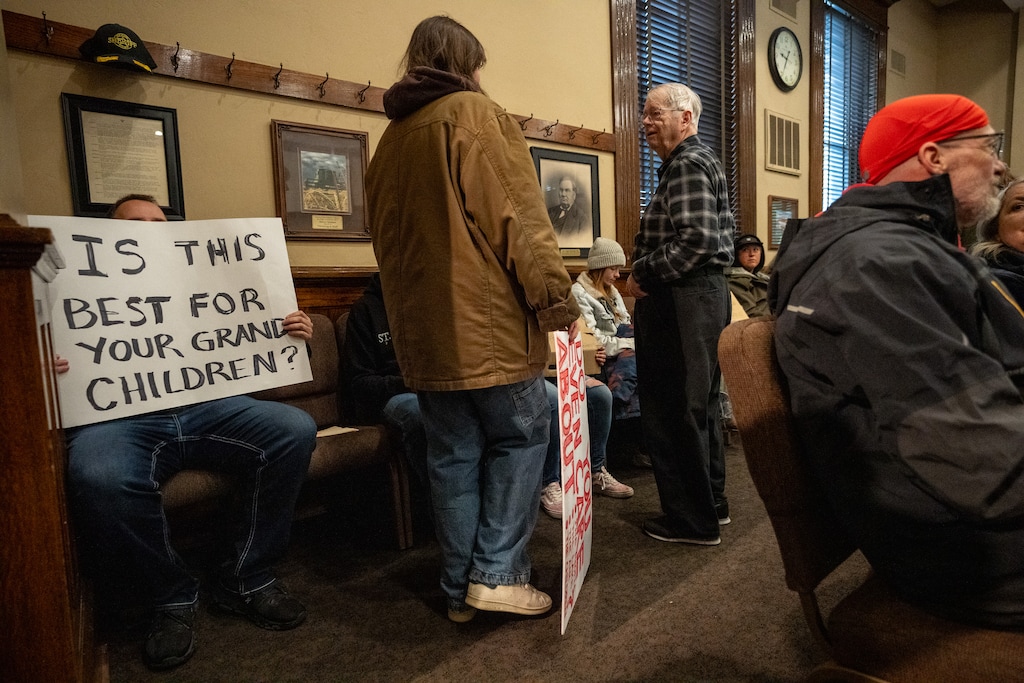 (Trent Nelson  |  The Salt Lake Tribune) People debate the project as the Box Elder County Commission prepared to meet on a MIDA and Kevin O'Leary data center project in Brigham City on Monday, April 27, 2026.