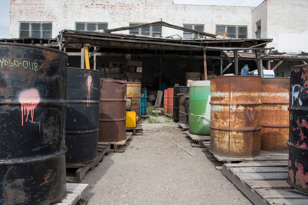 (Briana Scroggins  |  The Utah Investigative Journalism Project) Approximately 160 drums are organized by the properties of their contents on the south yard of the Swift building in Ogden on Thursday, May 16, 2019. "Most of the stuff in the south yard are flammable liquids," On-scene Coordinator for the EPA Paul Peronard said. Peronard said that he expects the total number of containers to reach about 60,000. The EPA started site clean up on April 1 and plan to finish by August 2019.