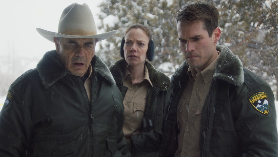(Photo courtesy of Orion Classics) Sheriff Hadley (Robert Forster, left), along with deputies Julia Robson (Riki Lindhome, center) and John Marshall (Jim Cummings) look at a bloody murder scene, in the filmed-in-Utah horror thriller "The Wolf of Snow Hollow."