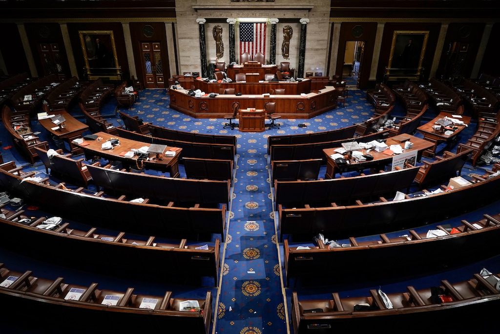 (J. Scott Applewhite | AP photo)

The House Chamber is empty after a hasty evacuation as rioters tried to break into the chamber at the U.S. Capitol on Wednesday, Jan. 6, 2021, in Washington.