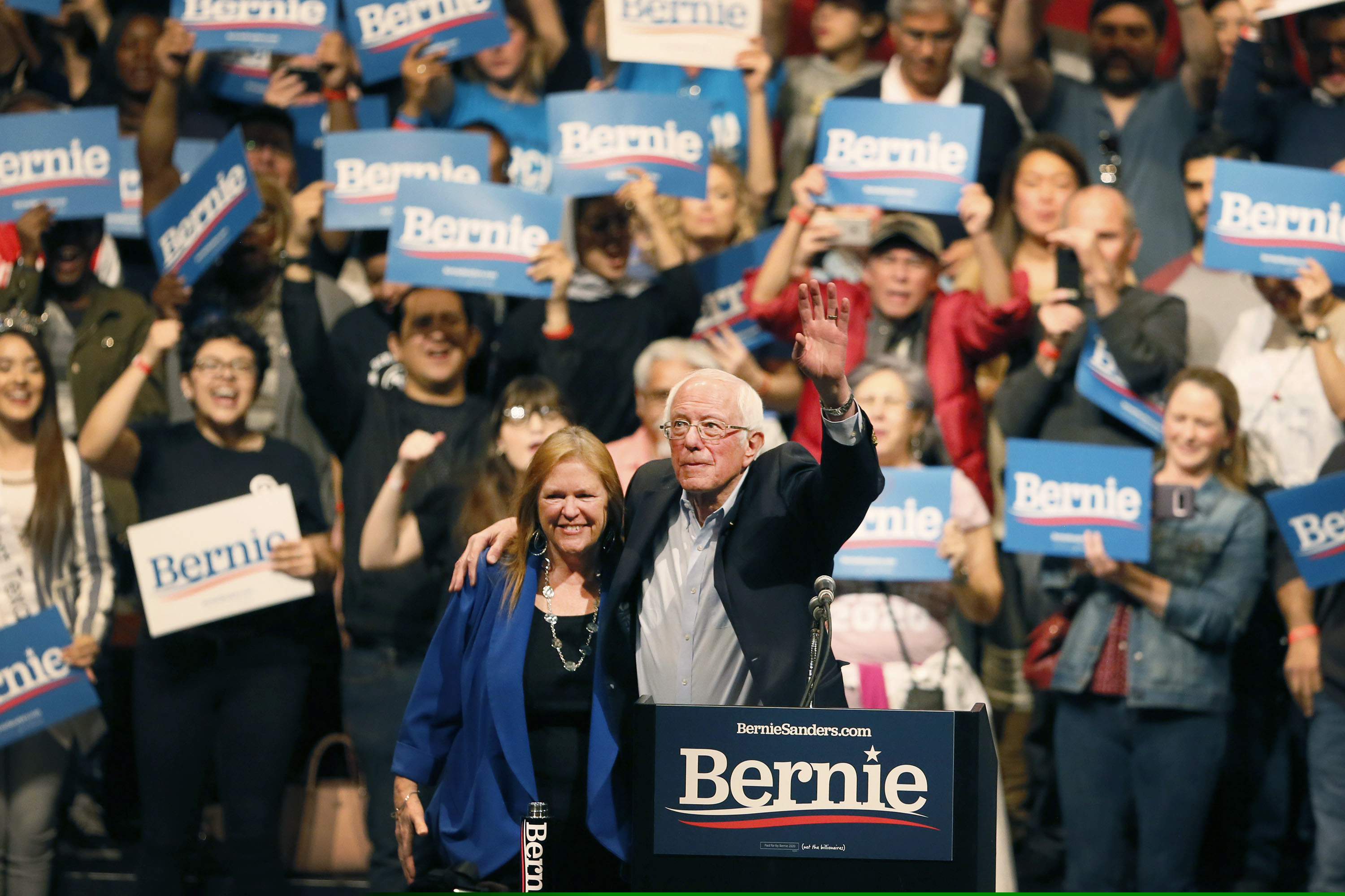 (Briana Sanchez | The El Paso Times via AP)  Democratic presidential candidate Sen. Bernie Sanders, I-Vt., with his wife Jane O'Meara Sanders, waves his hand during a rally in El Paso, Texas, Saturday, Feb. 22, 2020.