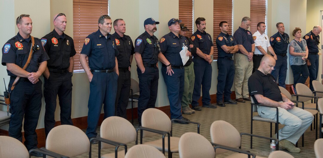 (Rick Egan  |  The Salt Lake Tribune)       Firefighters attend a news conference at Draper City Hall in memory of Matt Burchett, 42, who died fighting wildfires in California. Tuesday, Aug. 14, 2018.
