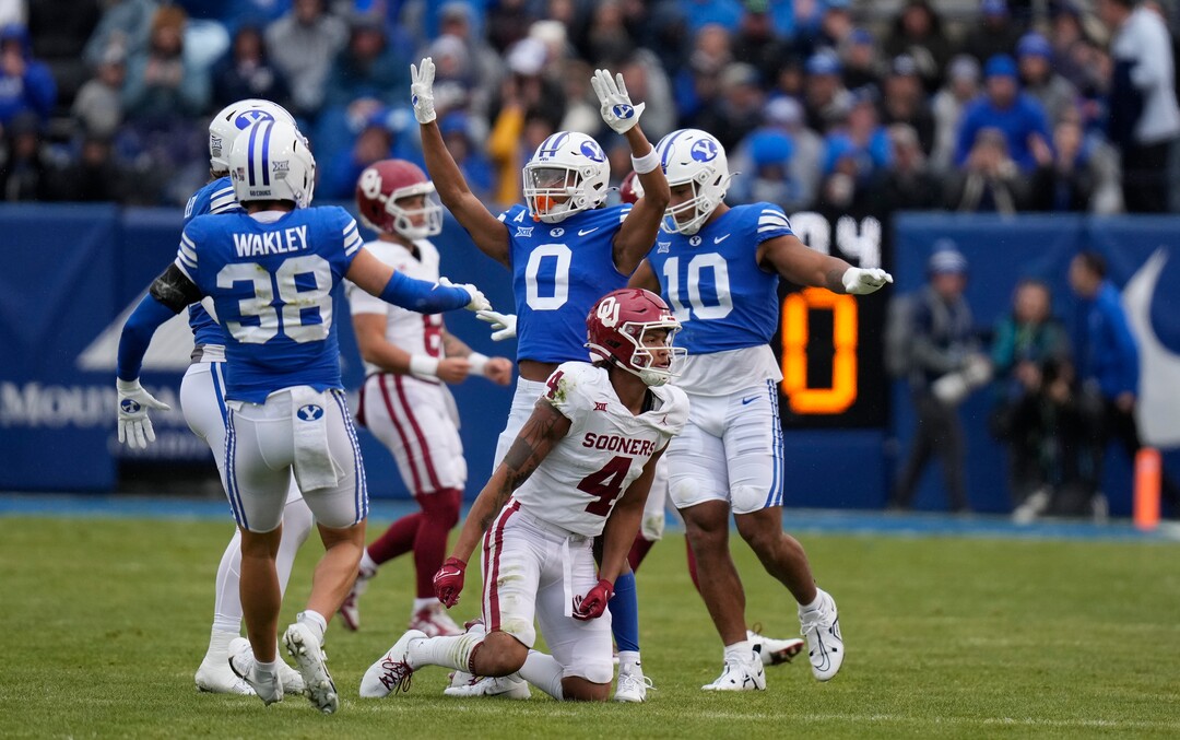 (Bethany Baker  |  The Salt Lake Tribune) Brigham Young Cougars celebrate after a play against the Oklahoma Sooners at LaVell Edwards Stadium in Provo on Saturday, Nov. 18, 2023.