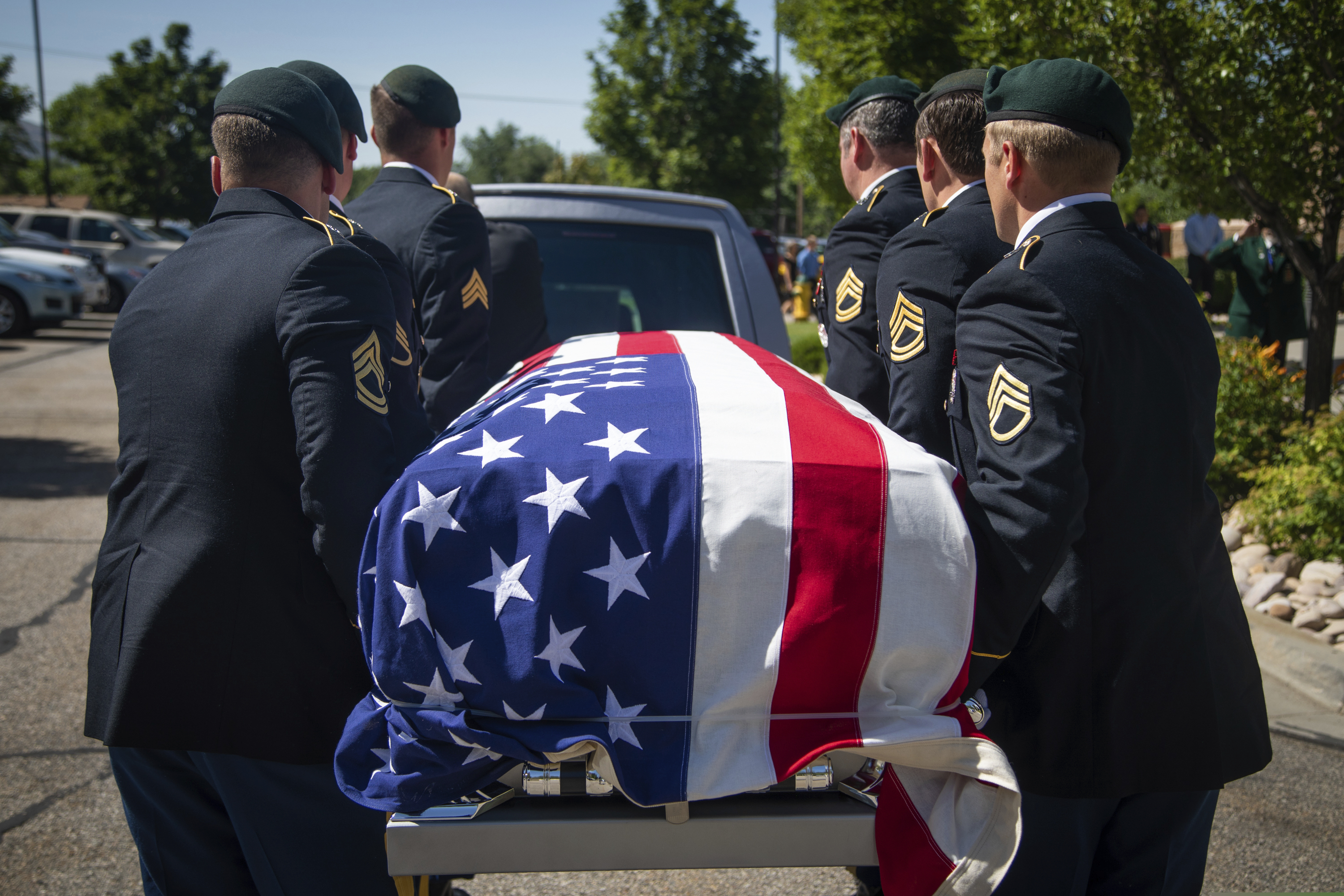 (Ben Dorger | Standard-Examiner via AP) Military personnel carry the remains of Army Sgt. 1st Class Elliott Robbins in a funeral procession on Thursday, July 18, 2019. Robbins died in a non-combat incident on June 30 while serving in Afghanistan.