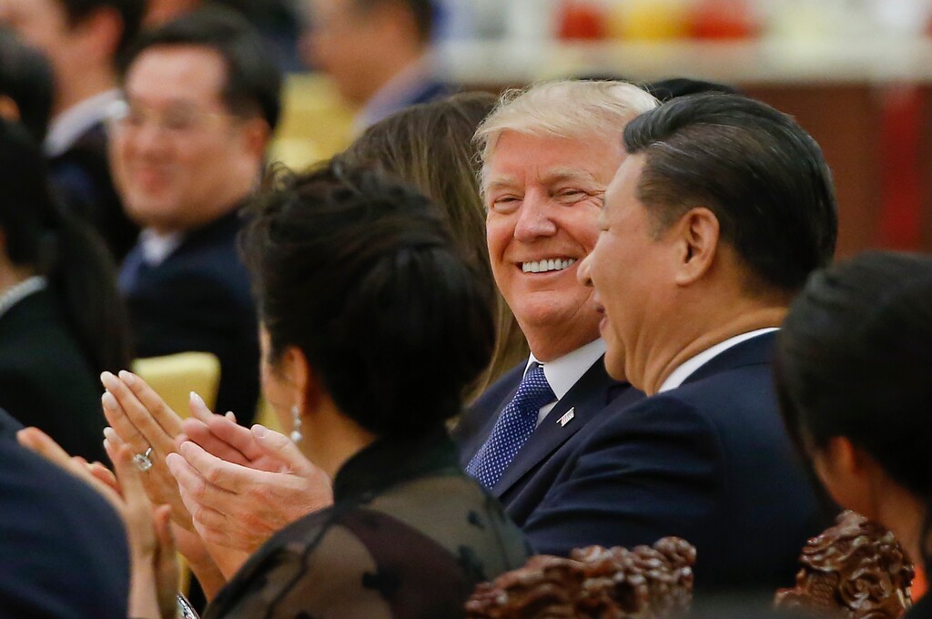 U.S. President Donald Trump and China's President Xi Jinping attend at a state dinner at the Great Hall of the People in Beijing, China, Thursday, Nov. 9, 2017. (Thomas Peter/Pool Photo via AP)