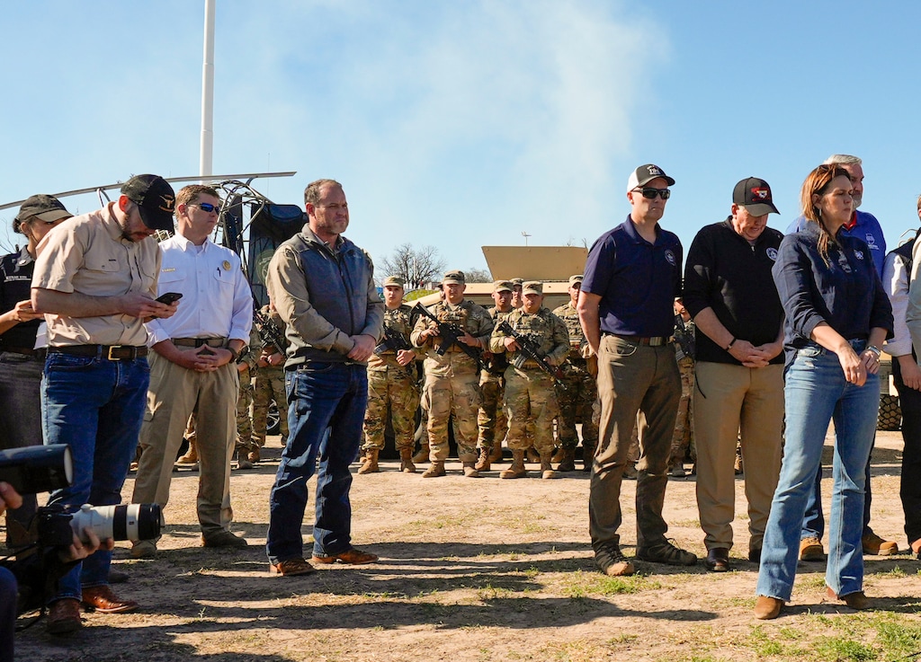 (Eric Gay | AP) Utah House Speaker Mike Schultz, fourth from left, R-Hooper, stands by Utah Gov. Spencer Cox during a press conference along the Rio Grande to discuss Operation Lone Star and border concerns, Sunday, Feb. 4, 2024, in Eagle Pass, Texas.