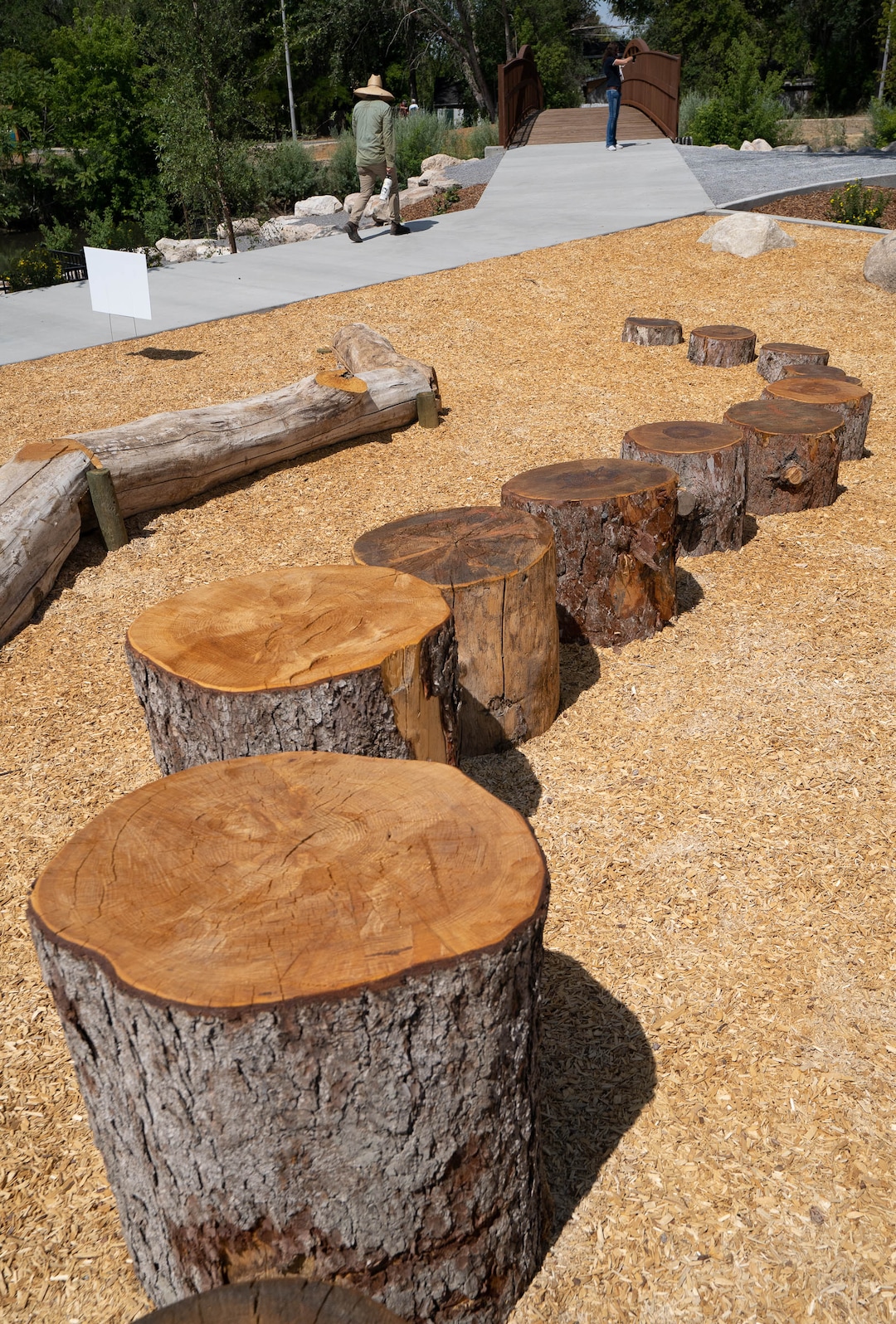 (Francisco Kjolseth  |  The Salt Lake Tribune) Tree stumps great wind storm of 2020 are repurposed into a playground at Three Creeks Confluence Park, Salt Lake City’s newest park as it opens on Wednesday, July 7, 2021, in the Glendale neighborhood.