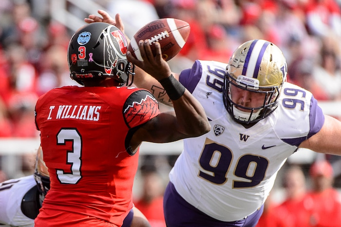 Trent Nelson  |  The Salt Lake Tribune
Washington Huskies defensive lineman Greg Gaines (99) pressures Utah Utes quarterback Troy Williams (3) as the University of Utah faces Washington, college football at Rice-Eccles Stadium in Salt Lake City, Saturday October 29, 2016.