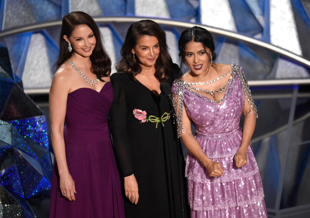 (Chris Pizzello | Invision | The Associated Press) Ashley Judd, from left, Annabella Sciorra and Salma Hayek speak at the Oscars on Sunday, March 4, 2018, at the Dolby Theatre in Los Angeles.