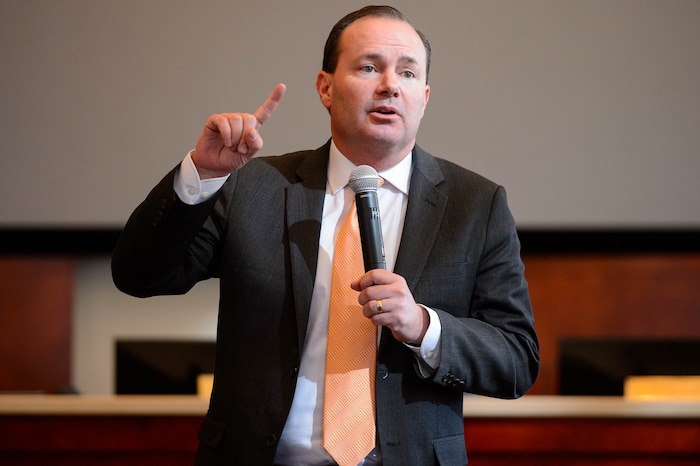 (Trent Nelson  |  The Salt Lake Tribune) Sen. Mike Lee answers questions at a town hall in Draper on Wednesday, Feb. 19, 2020.