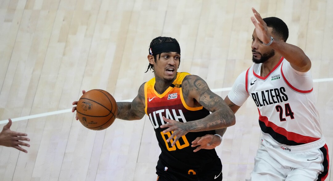 (Francisco Kjolseth | The Salt Lake Tribune) Utah Jazz guard Jordan Clarkson (00) is pressured by Portland Trail Blazers forward Norman Powell (24) in NBA action between the Utah Jazz and the Portland Trail Blazers, at Vivint Smart Home Arena, on Wednesday, May 12, 2021.