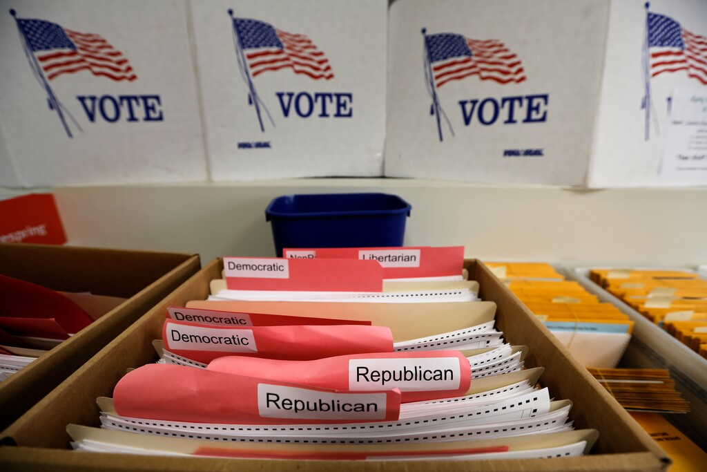 (Nati Harnik | AP file photo)  Ballots for the primary elections are arranged by party affiliation at the Lancaster County Election Committee offices in Lincoln, Neb., on April 14, 2020.