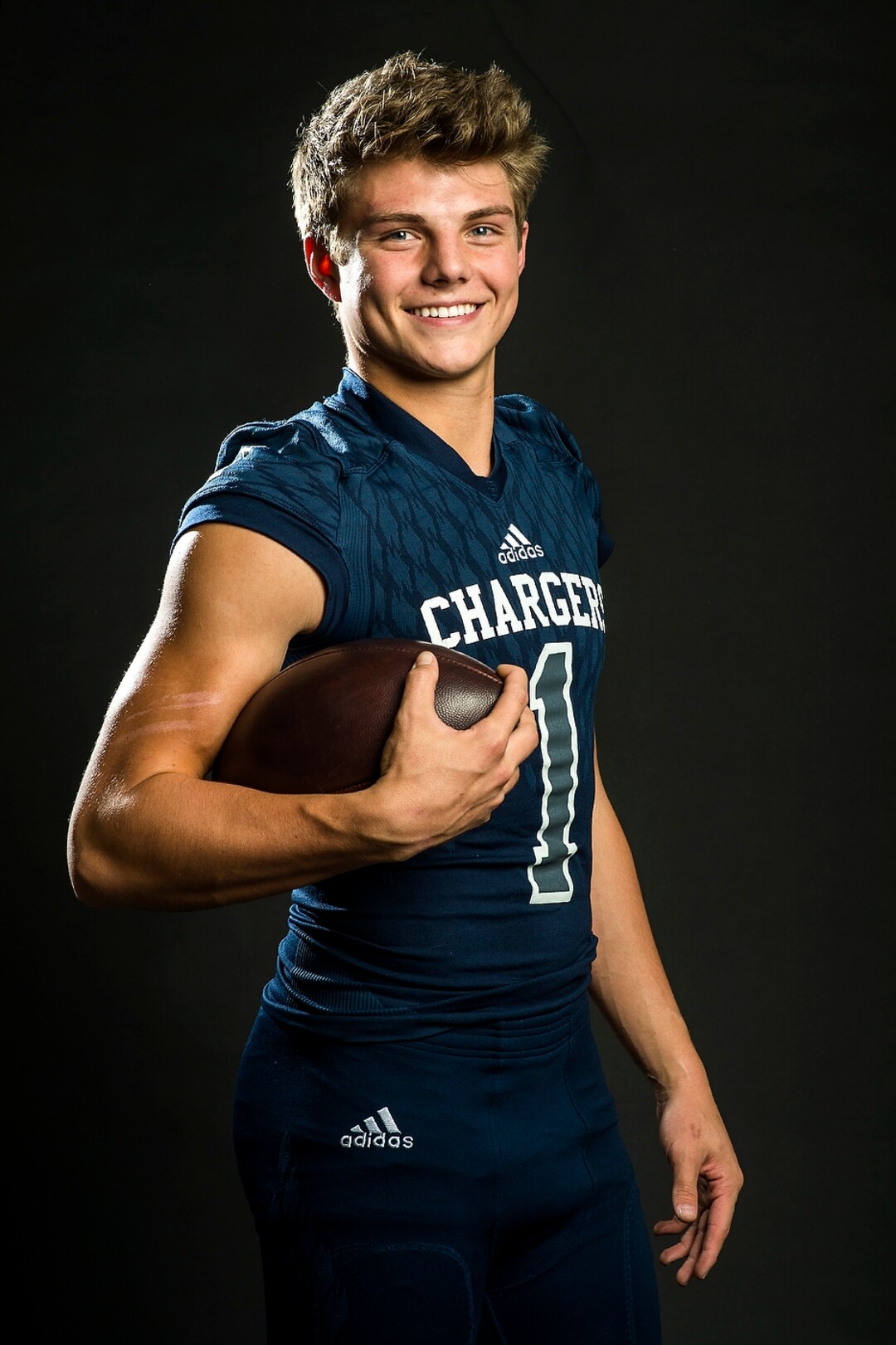 (Chris Detrick  |  The Salt Lake Tribune)  Corner Canyon quarterback Zach Wilson poses for a portrait Wednesday, December 13, 2017.  