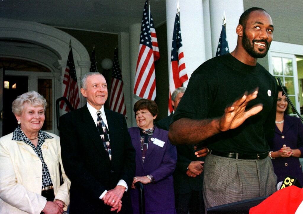(Douglas C. Pizac | AP) Utah Jazz forward Karl Malone, right, has fun with Sen. Orrin Hatch, R-Utah, second from left, during a fund-raising event at a bed and breakfast inn owned by Malone's wife Thursday, Aug. 19, 1999, in Salt Lake City. Hatch, accompanied by his wife Elaine, left, was making a bid for president under the GOP ticket.