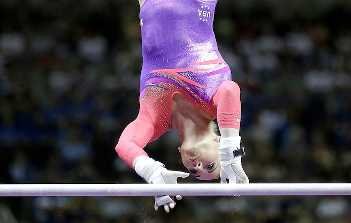 MyKayla Skinner competes on the uneven bars during the women's U.S. Olympic gymnastics trials in San Jose, Calif., Friday, July 8, 2016. (AP Photo/Ben Margot)