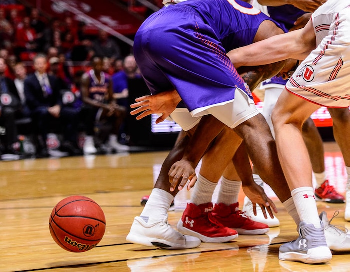 (Trent Nelson | The Salt Lake Tribune)  The ball escapes from the humans as the University of Utah hosts Northwestern State, NCAA basketball in Salt Lake City, Wednesday December 20, 2017.
