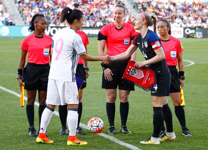 Japan forward Yuki Ogimi (9) and U.S. defender Becky Sauerbrunn (4) shake hands before an international friendly soccer match between Japan and the U.S. Thursday, June 2, 2016, in Commerce City, Colo. The match ended in a 3-3 tie. (AP Photo/Jack Dempsey)