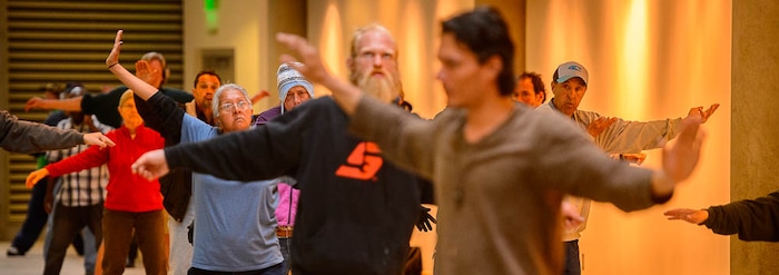 (Trent Nelson | The Salt Lake Tribune)  
A group of homeless people practice tai chi at the Main Library in Salt Lake City on Wednesday April 3, 2019.