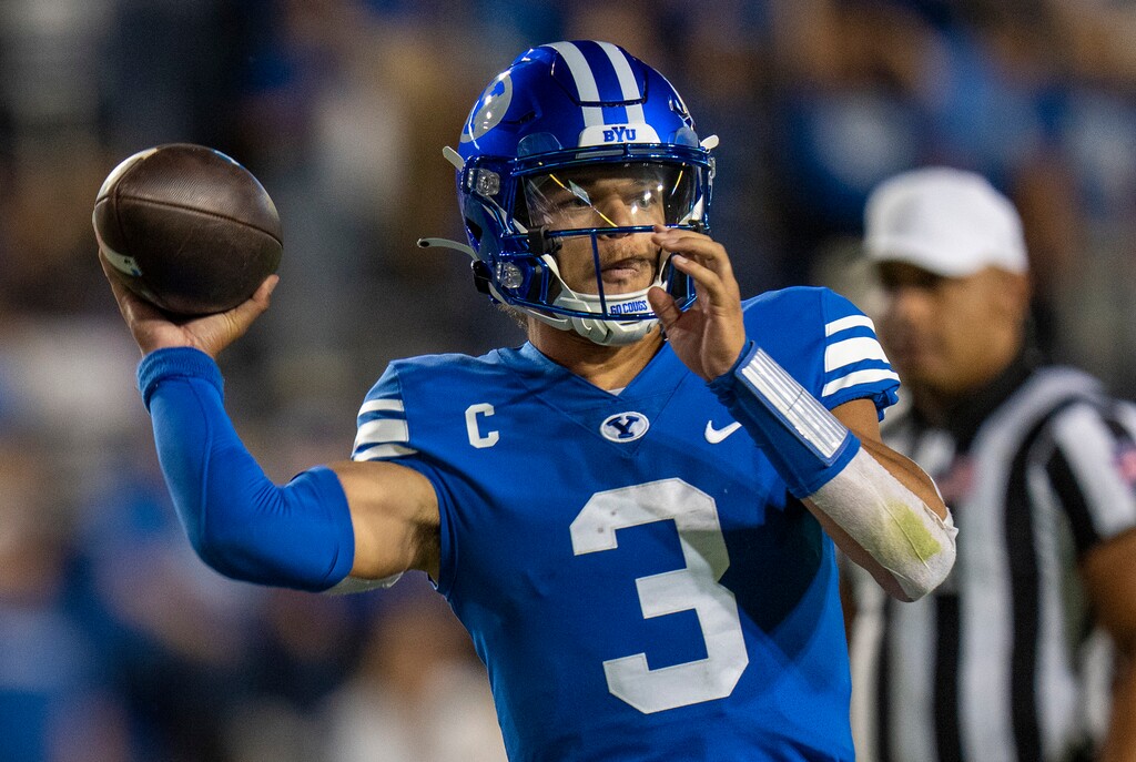 (Rick Egan | The Salt Lake Tribune) Brigham Young quarterback Jaren Hall (3) throws the ball for the Cougars, in Football action between the Brigham Young Cougars and the Utah State Aggies, at LaVell Edwards Stadium in Provo, on Thursday, Sept. 29, 2022.