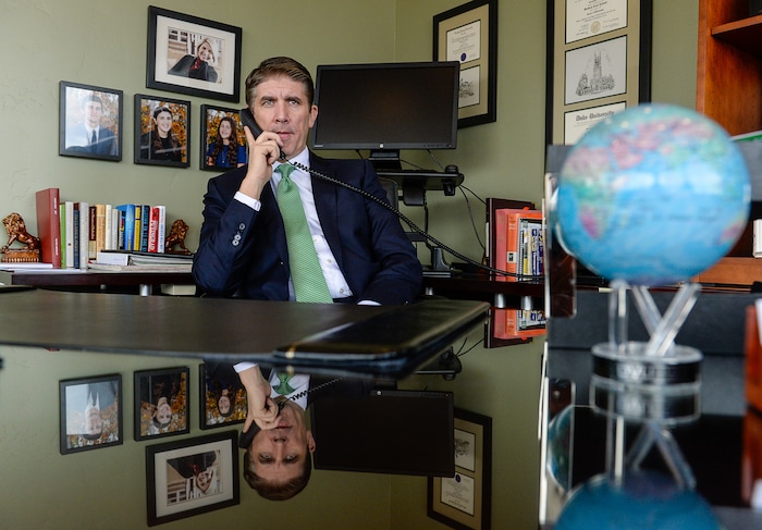 (Francisco Kjolseth | The Salt Lake Tribune) Utah Valley University President Matthew S. Holland takes a news radio interview on Monday, Nov. 6, 2017, following his announced calling as an LDS mission president. Holland's last day as UVU president will be in early June of 2018.