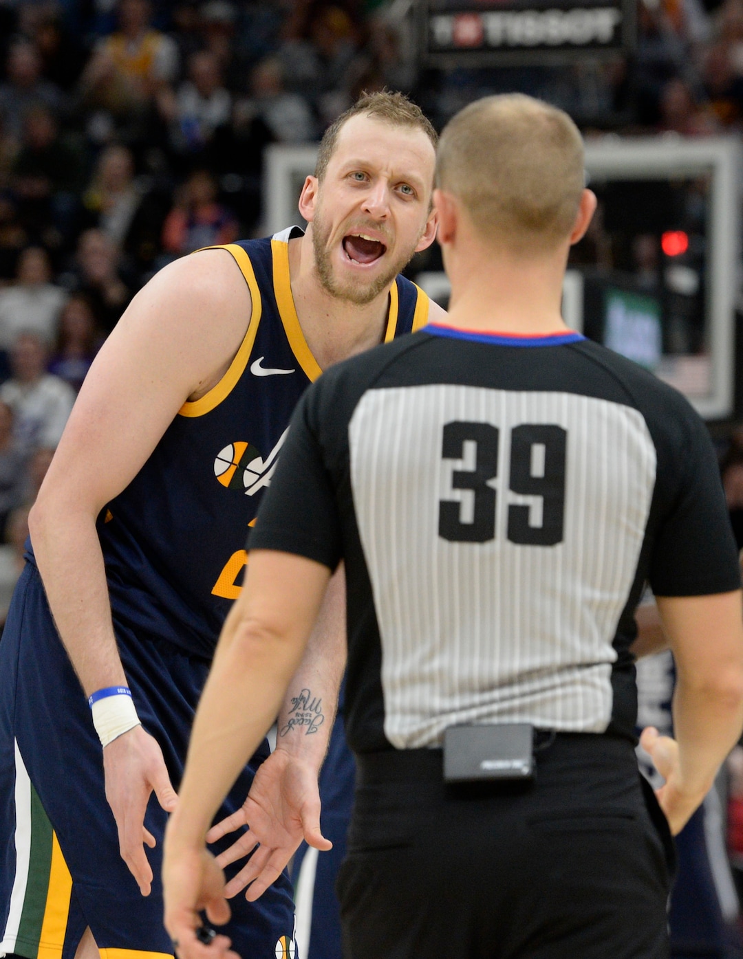 (Leah Hogsten  |  The Salt Lake Tribune) Utah Jazz forward Joe Ingles (2) confers with referee Tyler Ford as the Utah Jazz defeated the Golden State Warriors, 114-106, Dec. 13, 2019 at Vivint Arena.