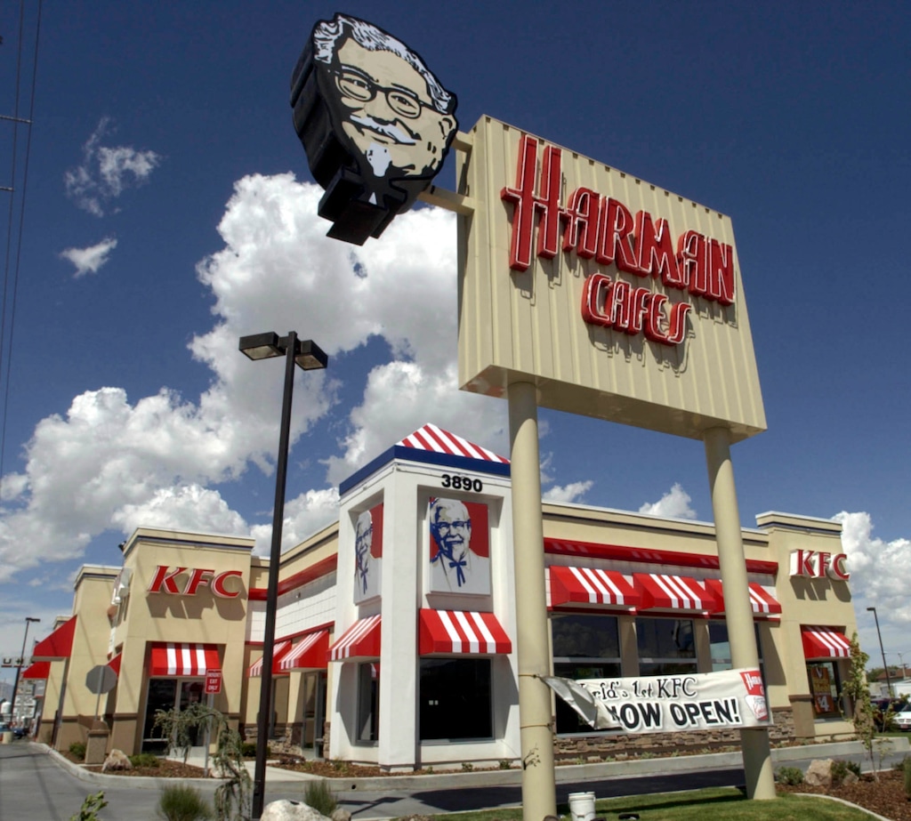 KFC has reopened a new store at the site of the first KFC in the world at 3890 South State in Salt Lake. Looking like the current KFC buildings of today, the new store features historical photographs and artifacts including one of the Colonel Sanders original suits. The grand opening will be Aug. 11. Photo by Francisco Kjolseth/The Salt Lake Tribune 08/06/2004