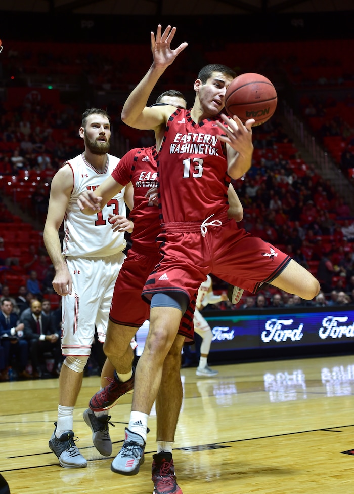 (Scott Sommerdorf   |  The Salt Lake Tribune)   Utah's David Collette is screened off from this rebound by Eastern Washington's Luka Vulikic during first half play. Utah defeated Eastern Washington 85-69, Friday, November 24, 2017. 