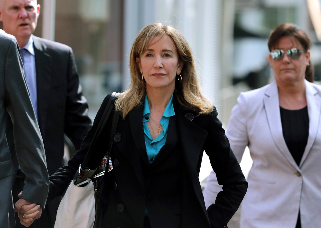 (Charles Krupa | Associated Press file photo) Actress Felicity Huffman arrives at federal court in Boston on Wednesday, April 3, 2019, to face charges in a nationwide college admissions bribery scandal.