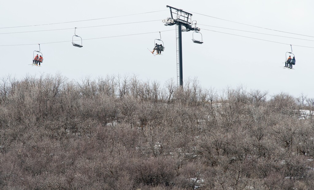 (Steve Griffin | Tribune file photo) Skiers ride a lift at the Park City Mountain Resort in Park City, Friday, Feb. 6, 2015.