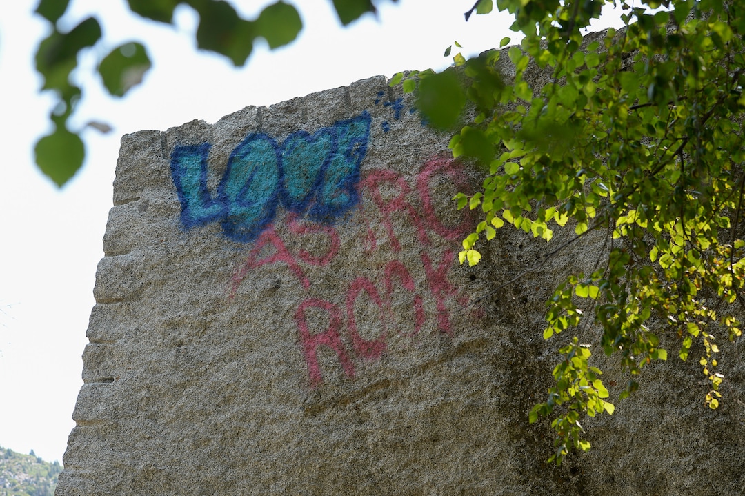(Francisco Kjolseth  |  The Salt Lake Tribune)  Graffiti has proliferated in lower Little Cottonwood Canyon, where vandals, often wielding cans of fluorescent-colored spray paint, have covered granite faces, trees and structures. The vandalism is particularly apparent along the Temple Quarry Trail and the creek at the Moon Rock swimming hole and former pavilion site. Volunteers using donated equipment and solvents spend thousands of hours removing the paint from the rocks only to see graffiti return to the same faces or on rock nearby.