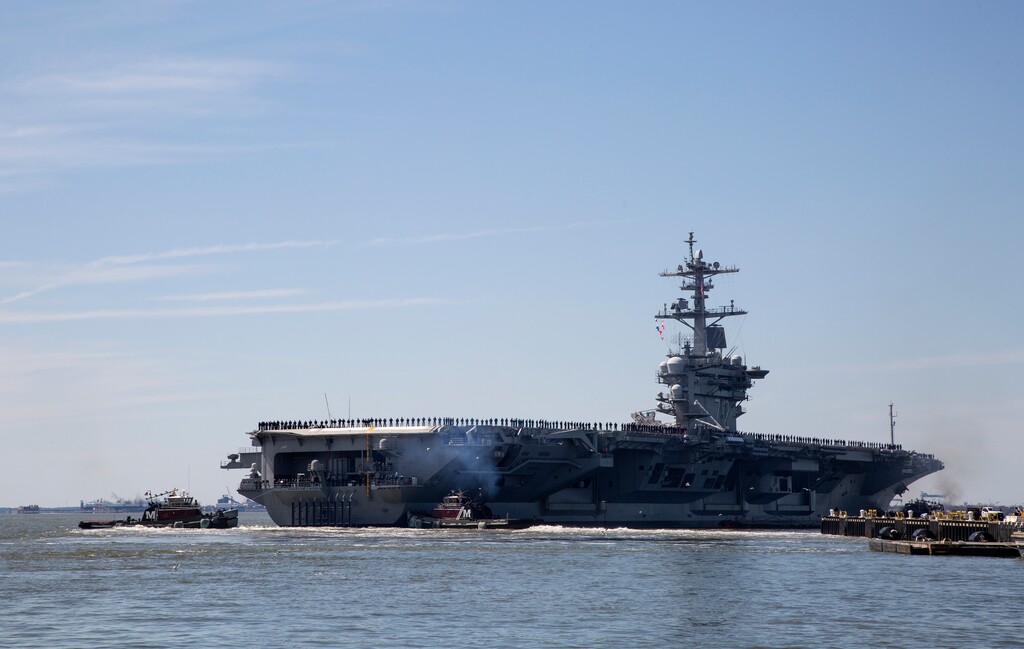 (Kaitlin McKeown | The Virginian-Pilot via AP file photo) The USS Abraham Lincoln deploys from Naval Station Norfolk, in the vicinity of Norfolk, Va., on April 1, 2019. The White House said Sunday, May 5, that the U.S. is deploying military resources to send a message to Iran. White House national security adviser John Bolton said in a statement that the U.S. is deploying the USS Abraham Lincoln Carrier Strike Group and a bomber task force to the U.S. Central Command region, an area that includes the Middle East.