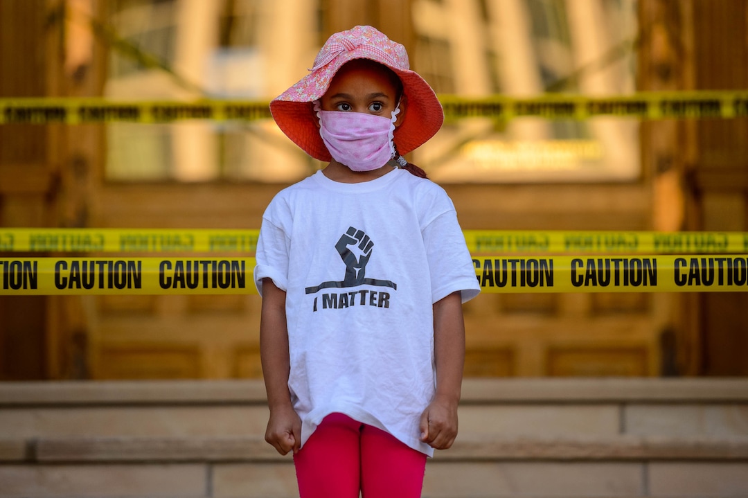 (Trent Nelson  |  The Salt Lake Tribune) A young girl at a Black Lives Matter protest at City Hall Salt Lake City on Wednesday, June 10, 2020.